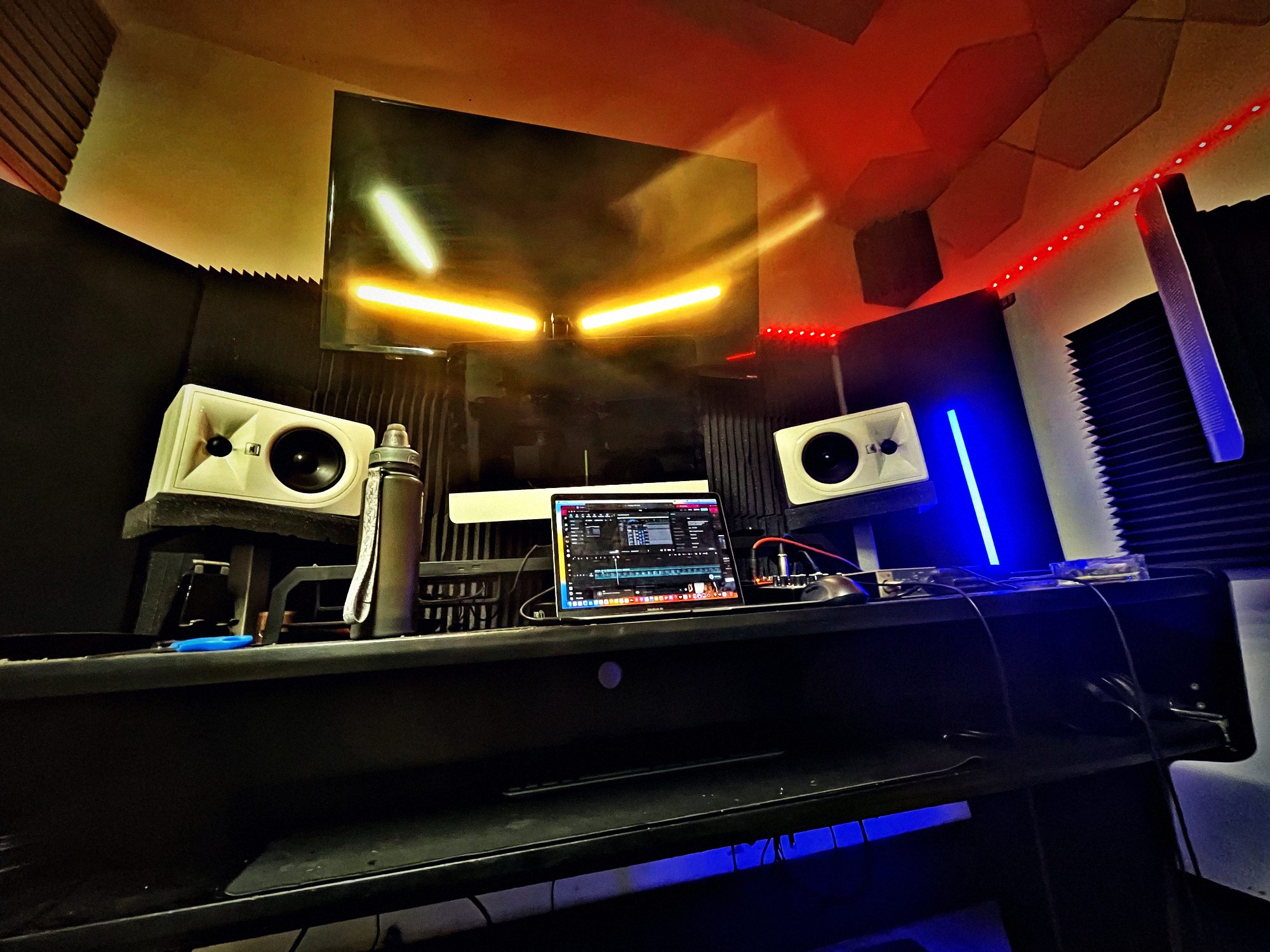 Studio monitors on the mix desk